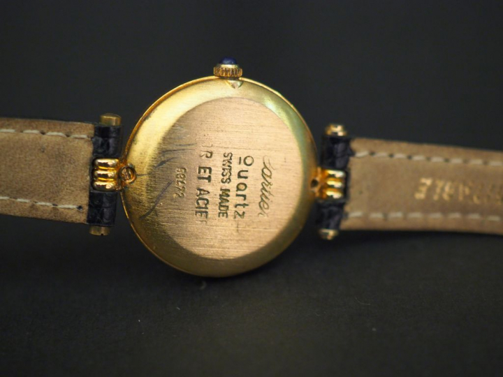 CARTIER, Vendôme Trinity. Montre bracelet de dame, boitier en or et ac