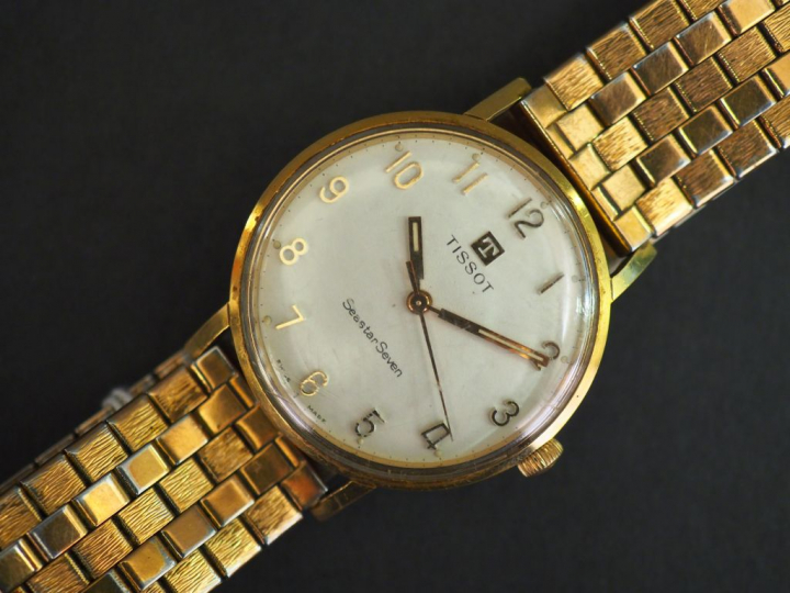 TISSOT, Seastar Seven Montre bracelet d’homme en plaqué or.  Cadran ro