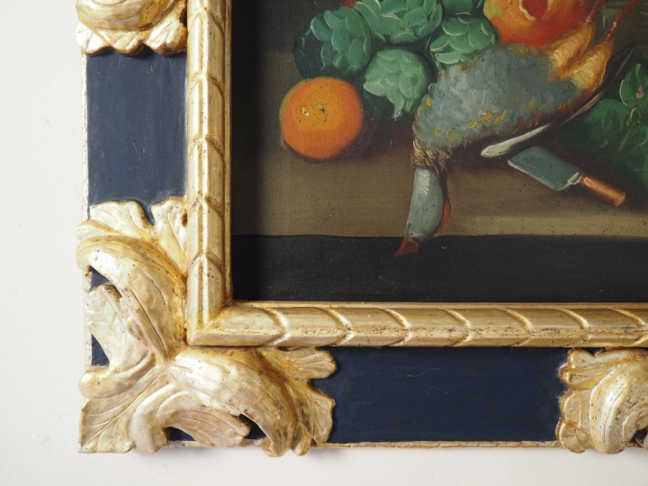 Paire d'huiles sur toile "nature morte" dans des cadres en bois sculpt