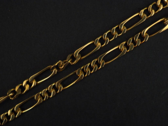 Vente aux enchères Grand sautoir en or jaune, maille figaro. Long. 69 cm Poids. 42,02 g