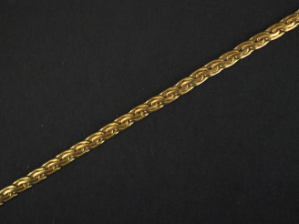 Vente aux enchères Bracelet souple en or jaune, maille tressée. Long. 17,5 cm Poids. 3,85