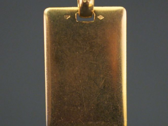 Vente aux enchères Pendentif rectangulaire en or jaune, gravée O RH-. 2,8 x 1,8 cm Poids.