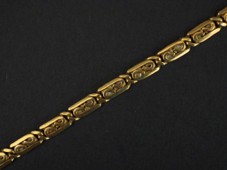 Vente aux enchères Bracelet articulé en or jaune, composé de maillons rectangulaires fili