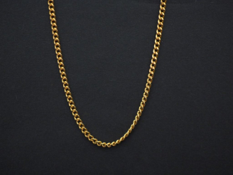 Vente aux enchères 	Chaine en or jaune, maille gourmette. Long. 42 cm Poids. 6,79 g