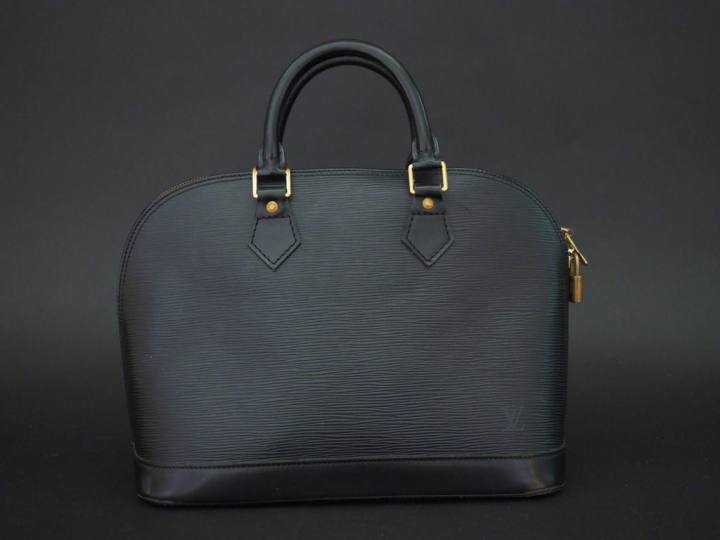 Louis VUITTON Sac modèle « Alma » en cuir épi noir. Double poignées. F