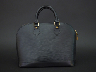 Vente aux enchères Louis VUITTON Sac modèle « Alma » en cuir épi noir. Double poignées. F