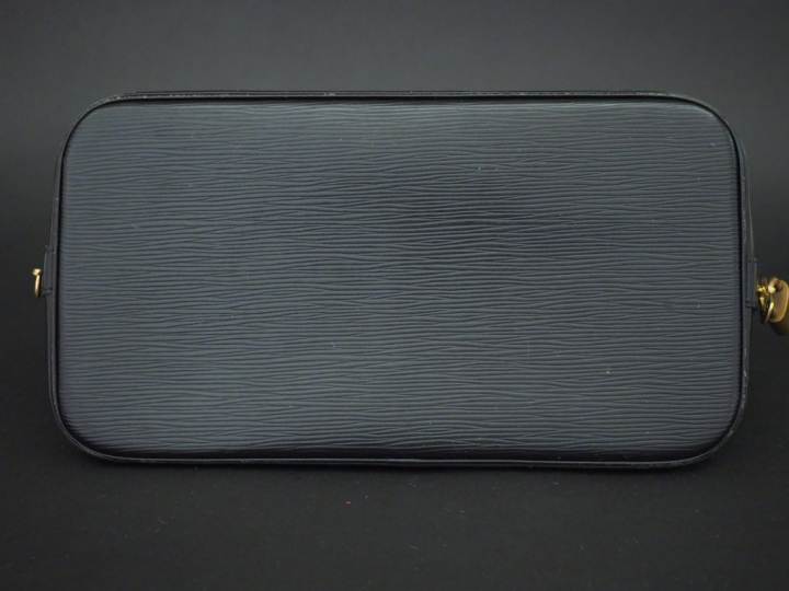 Louis VUITTON Sac modèle « Alma » en cuir épi noir. Double poignées. F