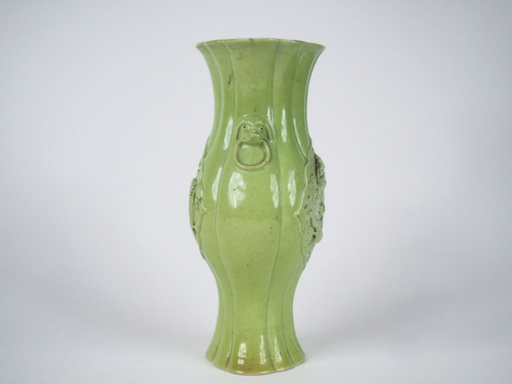 Paire de vases à panse godronnée en biscuit émaillé vert pomme, fineme