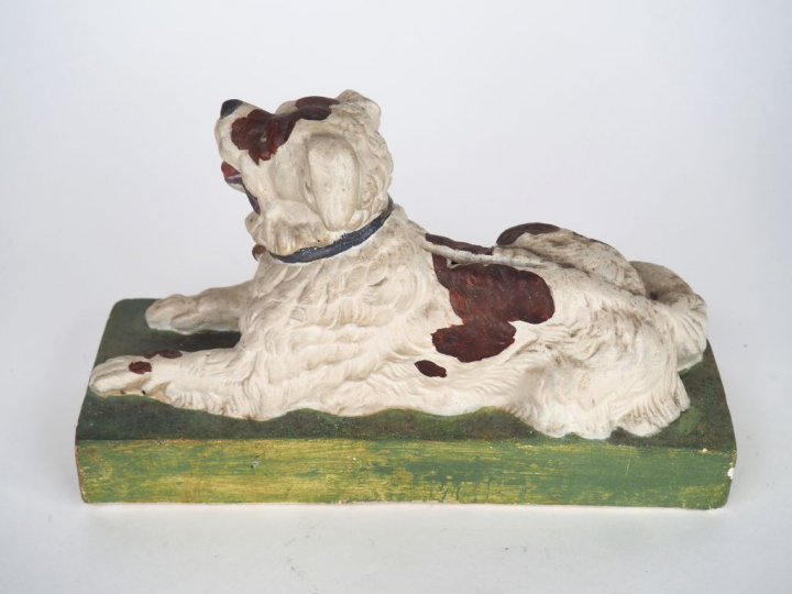 Tirelire début XXème en bois et plâtre polychrome figurant un Saint Be