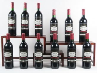 Vente aux enchères 12 BOUTEILLES CHÂTEAU PEYRELONGUE GC ST EMILION - 1997 - BG