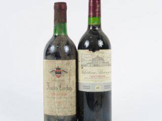 Vente aux enchères 2 BOUTEILLES : 1 CHÂTEAU NAUDIN LARCHEY GRAVES 1982 - 1 CHÂTEAU BARREY