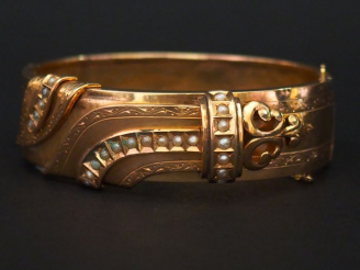 Vente aux enchères Bracelet manchette Napoléon III en or jaune et plaqué or, à décor d'un