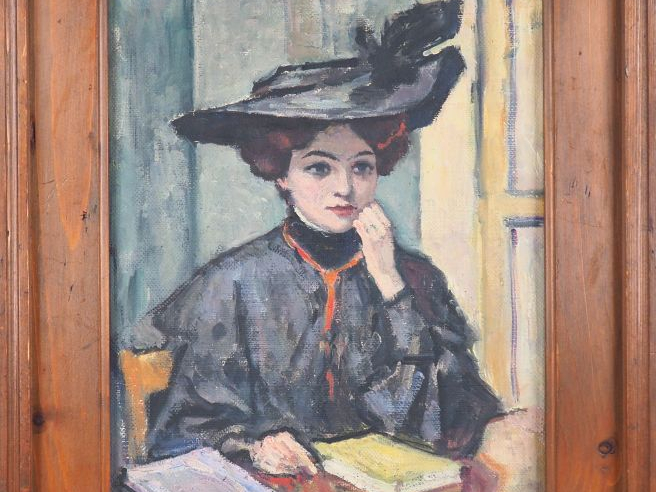 Charles GUERIN "Elégante au chapeau et aux livres" Huile sur toile. Si