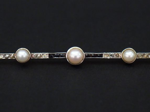 Broche barrette de style Art déco en or jaune, sertie de cinq demi per