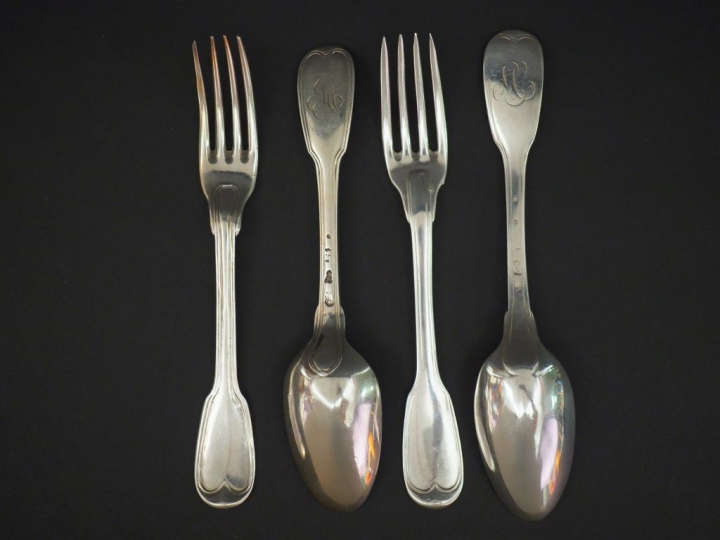 Deux différents grands couverts XVIIIème en argent. Monogrammés. Poids