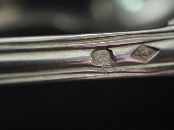 Ensemble comprenant :  - deux grands couverts Restauration en argent, 