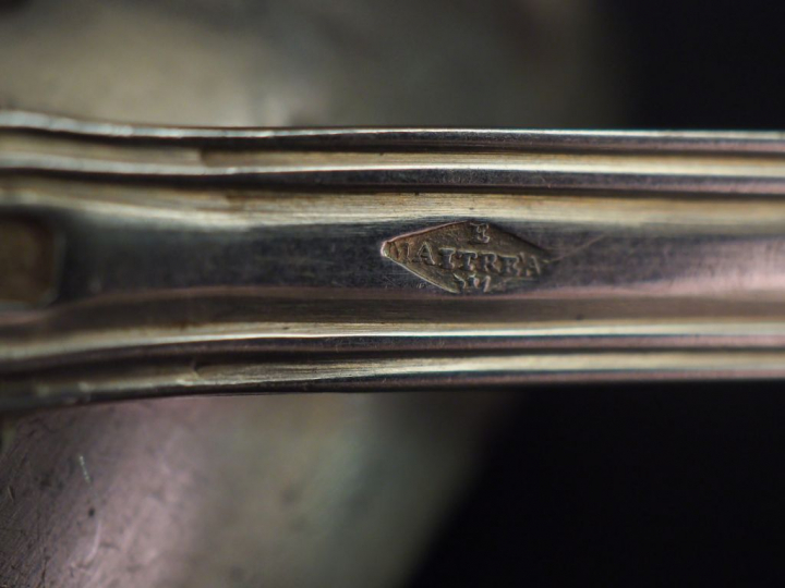 Ensemble comprenant :  - deux grands couverts en argent, poinçon Miner