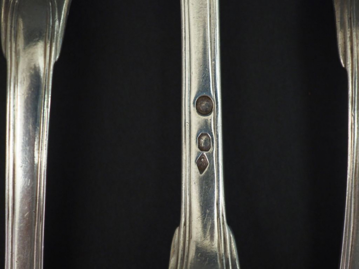 Ensemble comprenant :  - trois grands couverts en argent, poinçon Mine