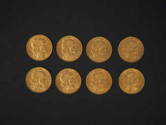 Vente aux enchères Huit pièces de 20 Francs or, 1910 (x2), 1911, 1912, 1913 (x3) et 1914.