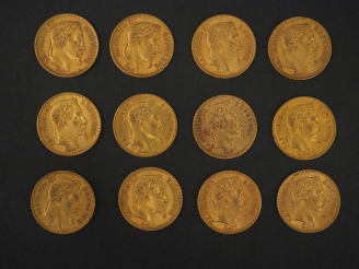 Vente aux enchères Douze pièces de 20 Francs or, 1861-A (x2), 1861-BB (x2), 1862-A (x2), 