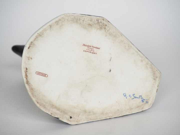SANDOZ ET HAVILAND.  Pichet en porcelaine polychrome en forme de tête 