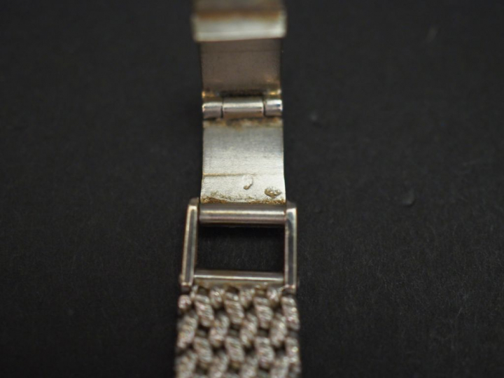 CYMA Montre bracelet de dame, boitier et bracelet en or blanc.  Cadran