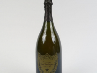Vente aux enchères 1 BOUTEILLE CHAMPAGNE DOM PÉRIGNON - 1985 - COFFRET - NIVEAU LIMITE CO