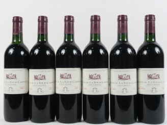 Vente aux enchères 6 BOUTEILLES CHÂTEAU LA TOUR CARNET GCC HAUT MEDOC - 1986 - 4 BG/1 LB/