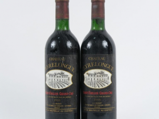 Vente aux enchères 2 BOUTEILLES CHÂTEAU PEYRELONGUE GC ST EMILION - 1988 - BG