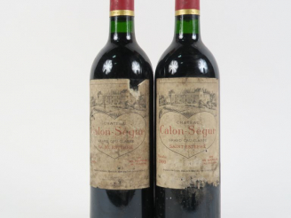 Vente aux enchères 2 BOUTEILLES CHÂTEAU CALON SEGUR GCC ST ESTEPHE - 1990 - BG/EA