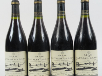 Vente aux enchères 4 BOUTEILLES MAS DE DAUMAS GASSAC : 1 de 2000 - 1 de 2001 - 2 de 2003