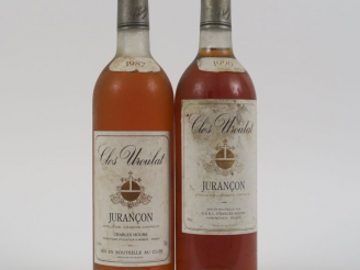 Vente aux enchères 2 BOUTEILLES CLOS UROULAT JURANCON - 1 de 1987 LB - 1 de 1990