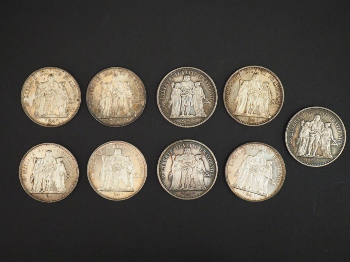 Ensemble comprenant :  - quatre pièces de 50 Francs en argent, 1974, 1