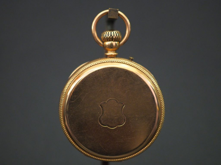 Montre de gousset en or jaune. Cadran émaillé à chiffres romains pour 