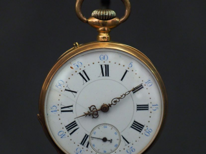 Montre de gousset en or jaune. Cadran émaillé à chiffres romains pour 