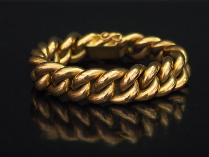 Bracelet articulé en or jaune, maille gourmette. Long. 19 cm  Larg. 1,