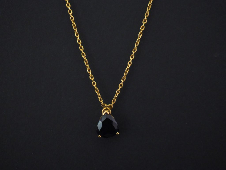 Chaine en or jaune, maille forçat, et son pendentif en or jaune serti 