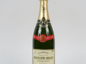 Vente aux enchères 1 BOUTEILLE CHAMPAGNE PERRIER JOUËT 'RESERVE CUVÉE' - 1985 - COFFRET