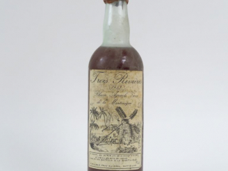 Vente aux enchères 1 BOUTEILLE RHUM TROIS RIVIÈRES 45° - 1953 - CAPS CIRÉE