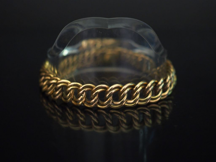 Bracelet articulé en or jaune, maille gourmette.  Long. 20 cm Poids. 4