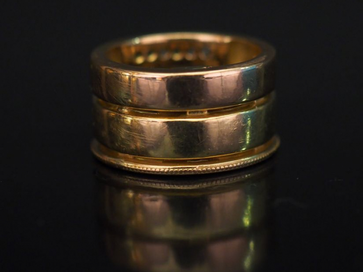 Bague trois anneaux accolés en or, sertie d'un diamant central, de dia