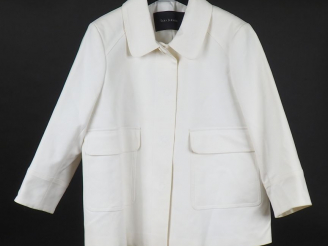 Vente aux enchères TARA JARMON Veste blanche à col en coton et élasthane. Fermeture par q