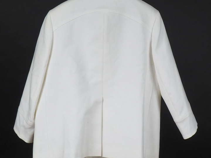 TARA JARMON Veste blanche à col en coton et élasthane. Fermeture par q