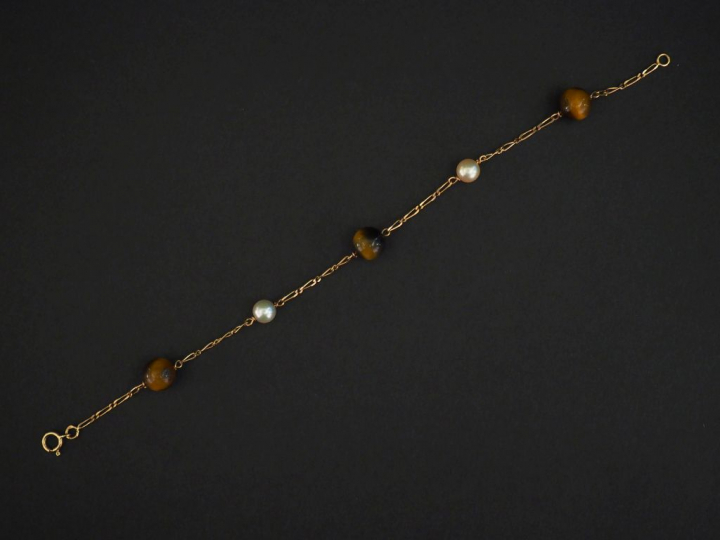 Bracelet souple en or jaune, maille cheval, orné de perles blanches et