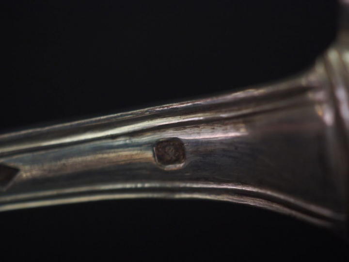 Ensemble comprenant :  - un couvert de  naissance en argent, poinçon M