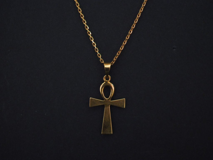 Chaine en or jaune, maille forçat, et son pendentif en or jaune en for