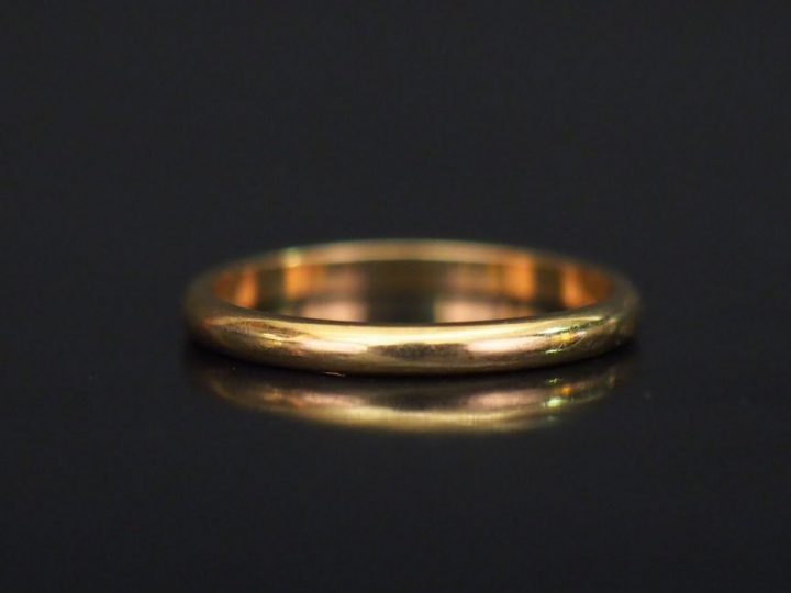 Alliance en or jaune.  TDD. 50 Poids. 1,65 g   