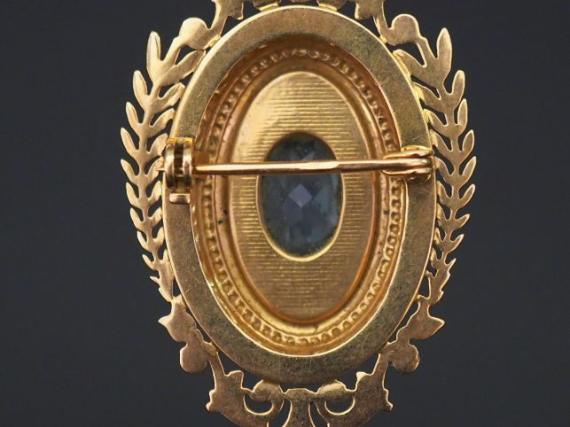 Broche/pendentif en or jaune, à décor de feuille de laurier, rinceaux 