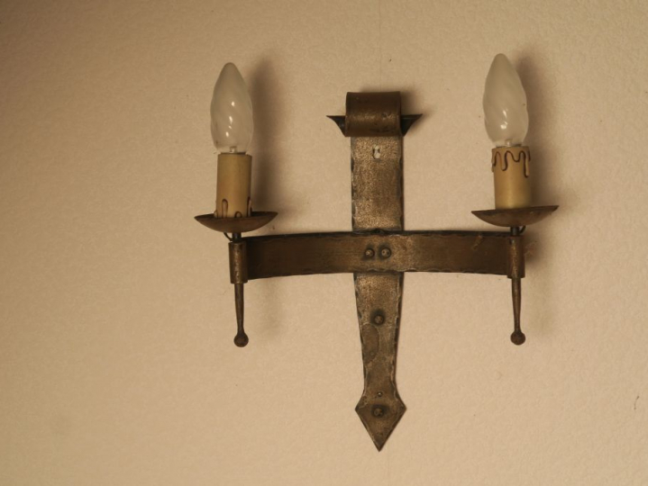 4 appliques en fer forgé.