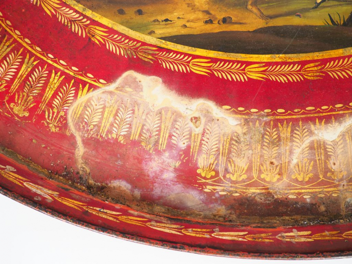 Grand plateau ovale début XIXème en tôle polychrome, représentant un p